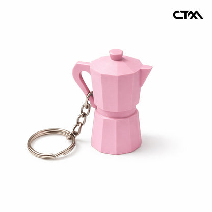 Pink coffee pot keychain on a white background
