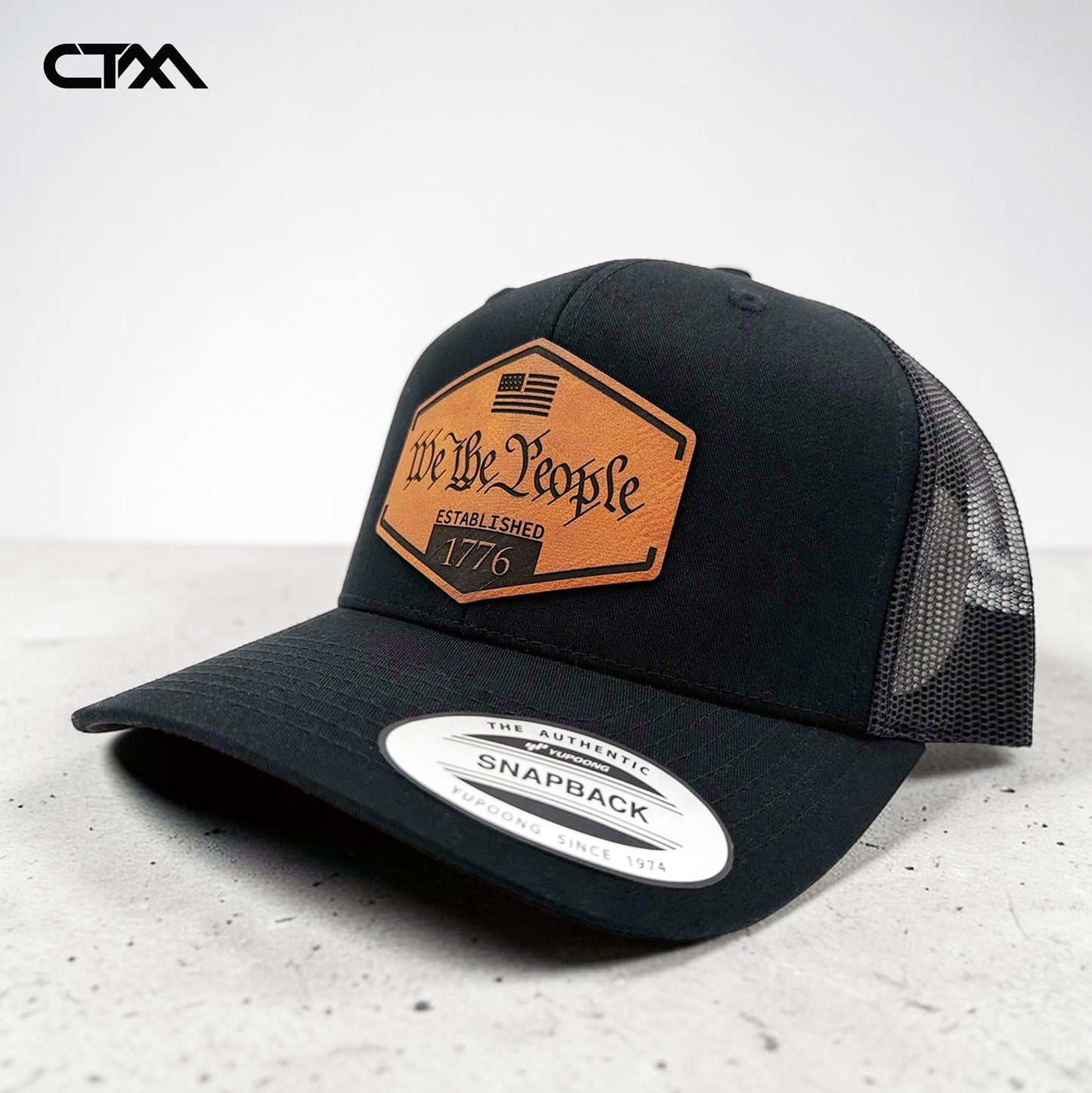 We The People 1776 Leather Patch Trucker Hat