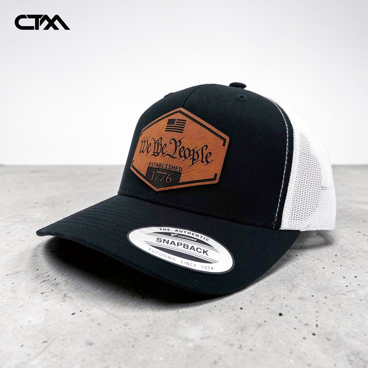 We The People 1776 Leather Patch Trucker Hat