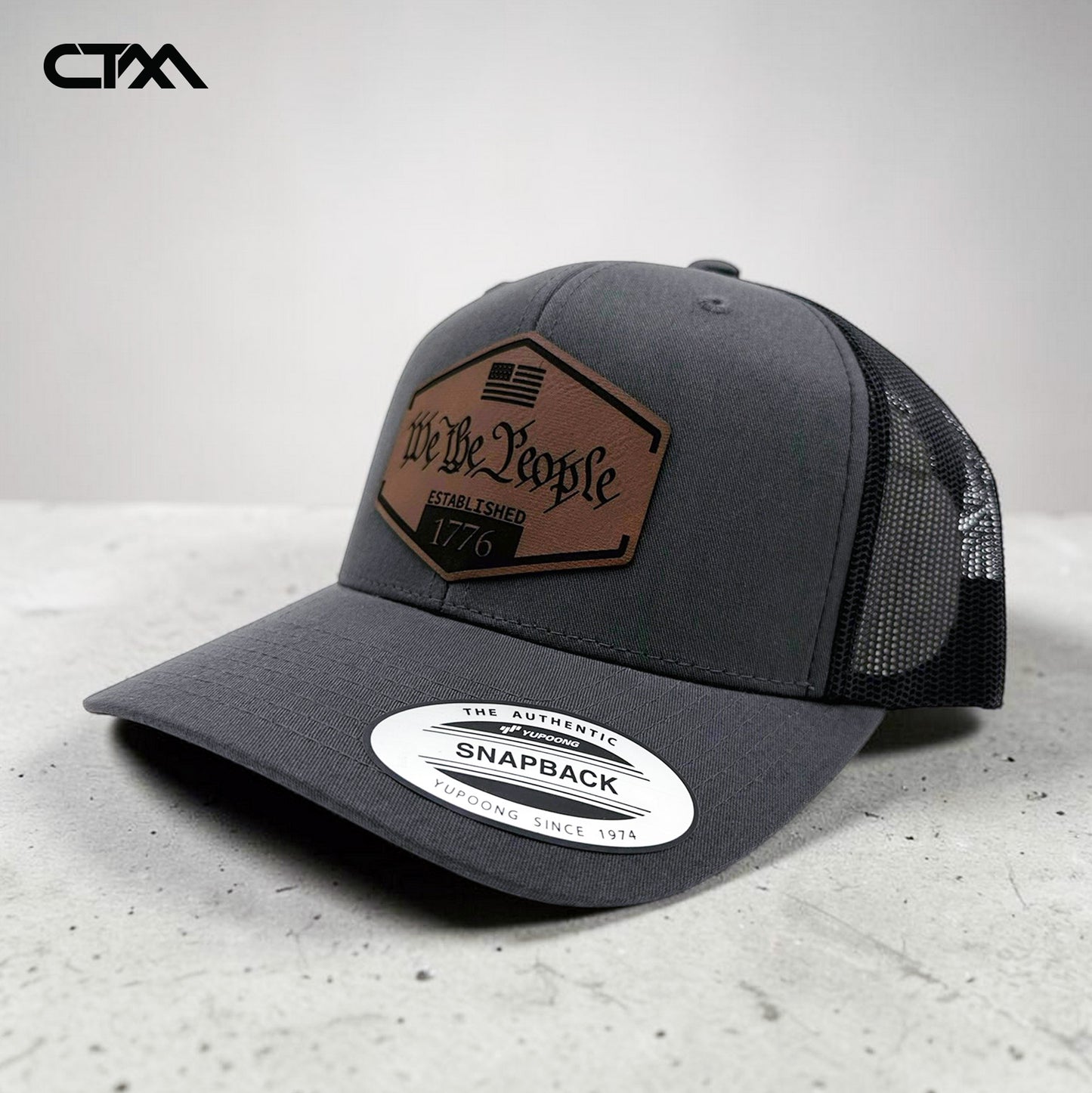 We The People 1776 Leather Patch Trucker Hat