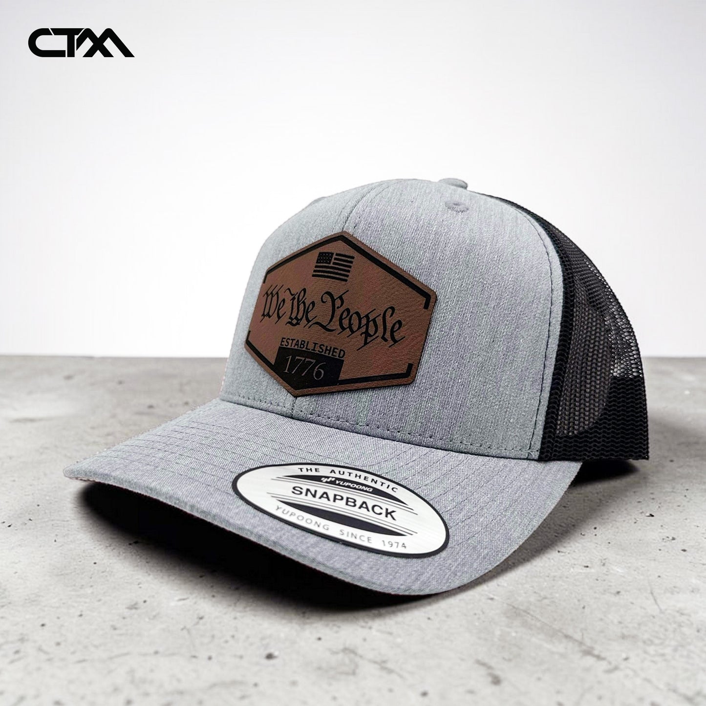 We The People 1776 Leather Patch Trucker Hat