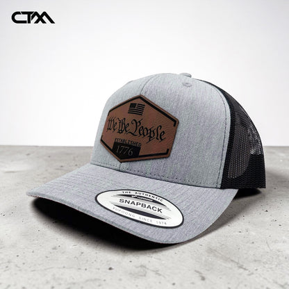 We The People 1776 Leather Patch Trucker Hat